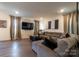 Relaxing living room with sectional sofa and large TV at 424 Wharton St, Monroe, NC 28110