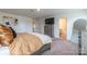 Spacious bedroom with ensuite bathroom and neutral tones at 424 Wharton St, Monroe, NC 28110
