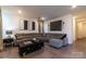 Spacious living room featuring a sectional sofa and hardwood floors at 424 Wharton St, Monroe, NC 28110