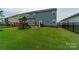 Spacious backyard featuring a playset and fenced area at 424 Wharton St, Monroe, NC 28110