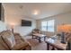 Versatile bonus room with seating area and large TV at 424 Wharton St, Monroe, NC 28110