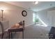 Home office with a writing desk, globe, and comfortable chair at 1016 Forest Dr, Marshville, NC 28103