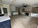 Open concept Gathering room with kitchen, fireplace and hardwood floors at 780 N Main St, Mount Pleasant, NC 28124