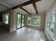 Bright dining area with hardwood floors and exposed beams at 780 N Main St, Mount Pleasant, NC 28124