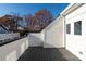 Private rooftop deck with composite decking, offering views of the surrounding area at 1409 Collier Walk Aly # Csw0104, Charlotte, NC 28205