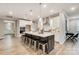 Gourmet kitchen features a large island, stainless steel appliances, and white cabinetry at 9633 Liberty Hill Dr, Mint Hill, NC 28227