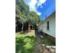 Side yard with mature trees, providing a natural border at 3130 Faith Rd, Salisbury, NC 28146