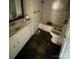 Clean bathroom with white vanity, tub, and toilet at 3130 Faith Rd, Salisbury, NC 28146