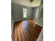 Cozy bedroom with hardwood floors and a large window, plenty of natural light at 3130 Faith Rd, Salisbury, NC 28146
