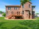 Brick house with a deck and a nicely landscaped lawn at 509 Pine Needle Ct, Weddington, NC 28104