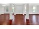 Spacious foyer with hardwood floors and columns at 509 Pine Needle Ct, Weddington, NC 28104