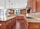 Spacious kitchen with granite countertops and modern cabinetry at 509 Pine Needle Ct, Weddington, NC 28104
