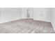 Spacious bedroom with neutral carpet and double doors at 509 Pine Needle Ct, Weddington, NC 28104