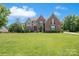 Two-story brick home with large yard at 509 Pine Needle Ct, Weddington, NC 28104