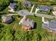 Aerial view of a neighborhood with houses and a cul-de-sac at 509 Pine Needle Ct, Weddington, NC 28104
