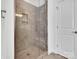 Large walk-in shower with glass enclosure and built-in seat at 509 Pine Needle Ct, Weddington, NC 28104