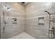 Large walk-in shower with multiple shower heads and built-in shelving at 0000 Lake Shore S Rd # 152, Denver, NC 28037