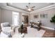 Home office with hardwood floors, a desk, and access to sunroom at 0000 Lake Shore S Rd # 152, Denver, NC 28037