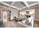 Open living room with hardwood floors and views into kitchen at 0000 Lake Shore S Rd # 152, Denver, NC 28037