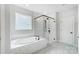 Bathroom with soaking tub and walk-in shower at 2003 Cedar Falls Dr # 69, Waxhaw, NC 28173