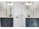 Double vanity bathroom with modern fixtures at 2003 Cedar Falls Dr # 69, Waxhaw, NC 28173