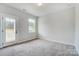 Spacious bedroom with private balcony access at 2003 Cedar Falls Dr # 69, Waxhaw, NC 28173