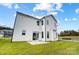 Home's rear exterior with patio and yard at 2003 Cedar Falls Dr # 69, Waxhaw, NC 28173
