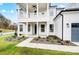 Stylish front entrance with white columns and a balcony at 2003 Cedar Falls Dr # 69, Waxhaw, NC 28173
