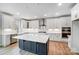 Spacious kitchen with white cabinets, large island, and stainless steel appliances at 2003 Cedar Falls Dr # 69, Waxhaw, NC 28173