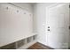 Mudroom with bench, cubbies, and hooks at 2003 Cedar Falls Dr # 69, Waxhaw, NC 28173