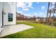 Small concrete patio and grassy backyard at 2003 Cedar Falls Dr # 69, Waxhaw, NC 28173