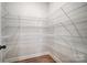 Walk-in pantry with wire shelving for ample storage at 2004 Cedar Falls Dr # 4, Waxhaw, NC 28173