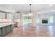 Open concept kitchen with island and breakfast area, overlooking backyard at 2004 Cedar Falls Dr # 4, Waxhaw, NC 28173