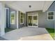Covered patio with sliding glass doors and gray siding at 2004 Cedar Falls Dr # 4, Waxhaw, NC 28173