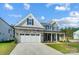 Two story house with gray siding and stone accents at 2004 Cedar Falls Dr # 4, Waxhaw, NC 28173