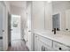 Bathroom with white vanity, a large mirror, and access to a bedroom at 2004 Cedar Falls Dr # 4, Waxhaw, NC 28173