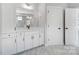 Modern bathroom featuring white cabinets, a quartz countertop, and hexagonal floor tile at 2004 Cedar Falls Dr # 4, Waxhaw, NC 28173