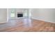 Open living room with fireplace and hardwood floors at 2004 Cedar Falls Dr # 4, Waxhaw, NC 28173