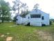 Back of house with yard and basketball goal at 6401 N Matson St, Kershaw, SC 29067