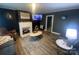 Living room features a fireplace and hardwood floors at 6401 N Matson St, Kershaw, SC 29067