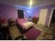bedroom with full-size bed and desk at 6401 N Matson St, Kershaw, SC 29067