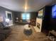 Spacious living room with hardwood floors and fireplace at 6401 N Matson St, Kershaw, SC 29067