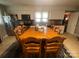 Kitchen with white cabinets, and a large dining table at 6401 N Matson St, Kershaw, SC 29067