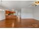 Open living and kitchen area with hardwood floors at 24589 Blue Heron Cir, Lancaster, SC 29720