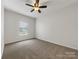 Bright bedroom with neutral walls and plush carpeting at 24589 Blue Heron Cir, Lancaster, SC 29720