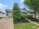 Cute house with screened porch and well-manicured landscaping at 24589 Blue Heron Cir, Lancaster, SC 29720