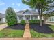 Charming craftsman style home with front porch and landscaped yard at 24589 Blue Heron Cir, Lancaster, SC 29720