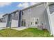 Private backyard with patio and grassy area at 6280 Culbert St # 190, Harrisburg, NC 28075