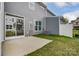 Small backyard with patio and sliding glass door at 6280 Culbert St # 190, Harrisburg, NC 28075