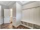 Bright entryway with built-in bench and access to powder room at 6280 Culbert St # 190, Harrisburg, NC 28075